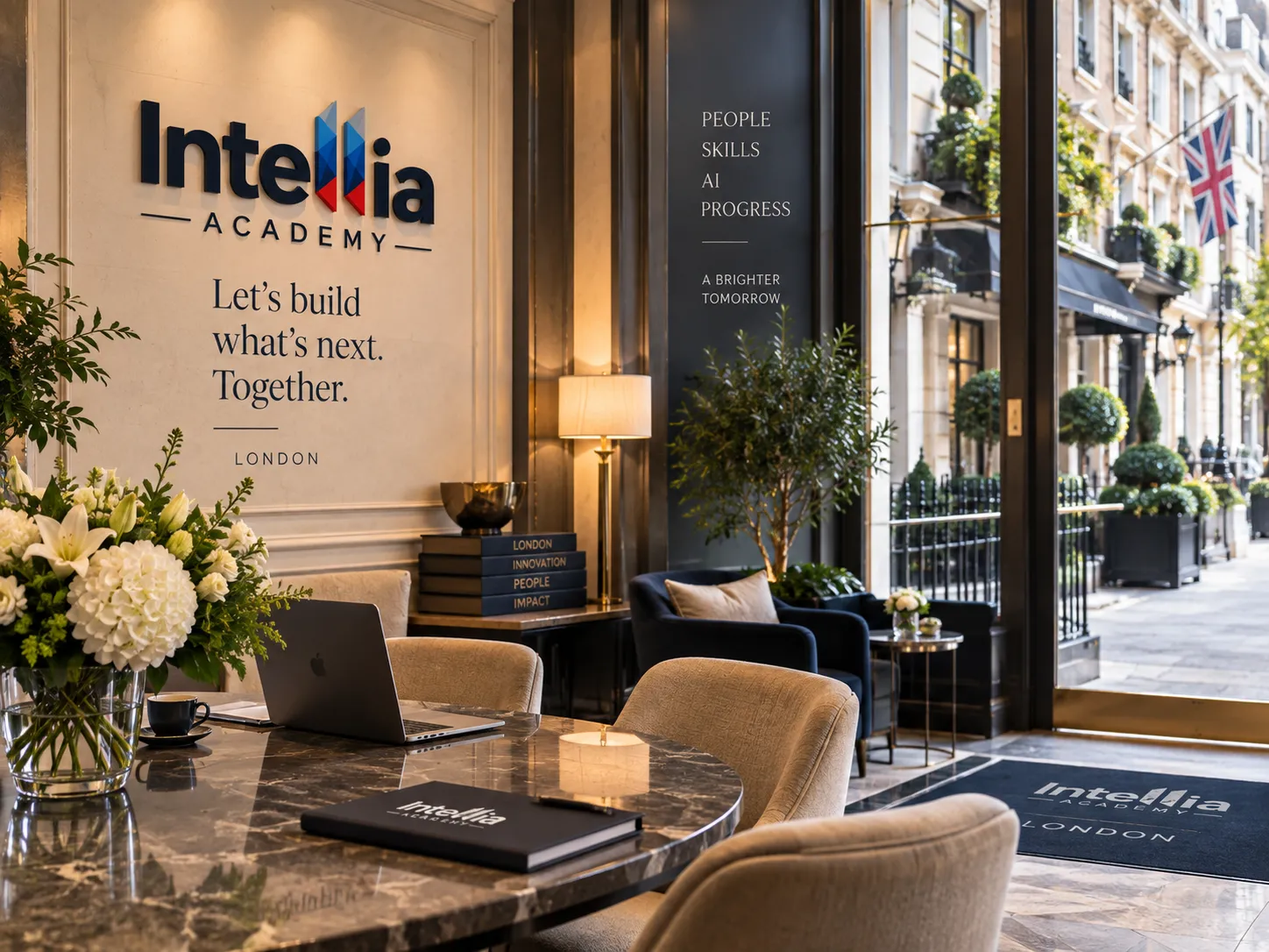 Intellia Academy's London lobby, with the reception wall and street view outside